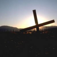 A cruz e o por do sol A cruz e o por do sol
